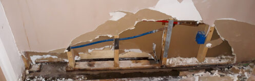 water damage on the floor of a home